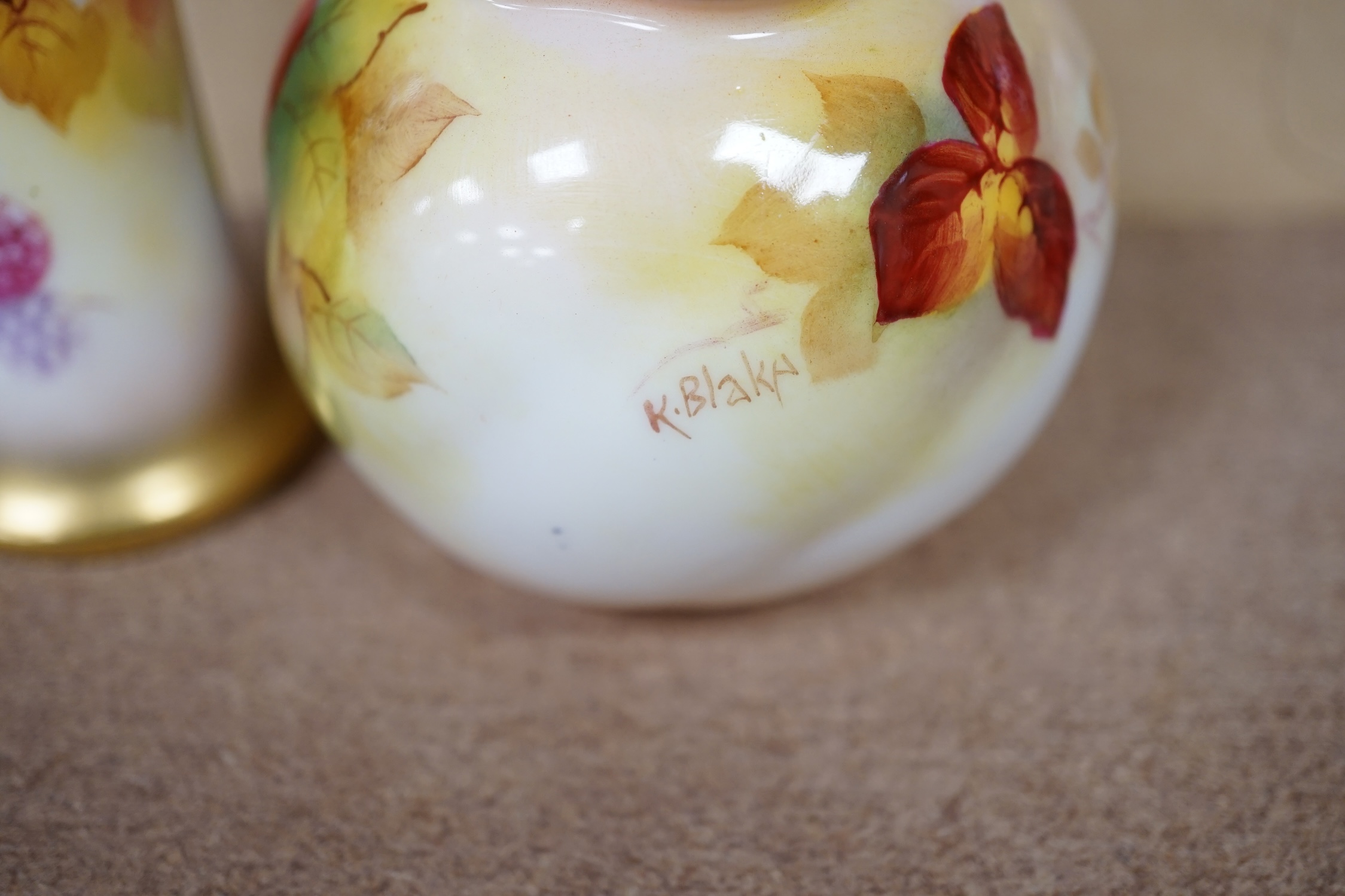 A Royal Worcester spill vase fruit painted with berries by Kitty Blake and a small bowl by the same artist, largest 11.5cm high. Condition - good